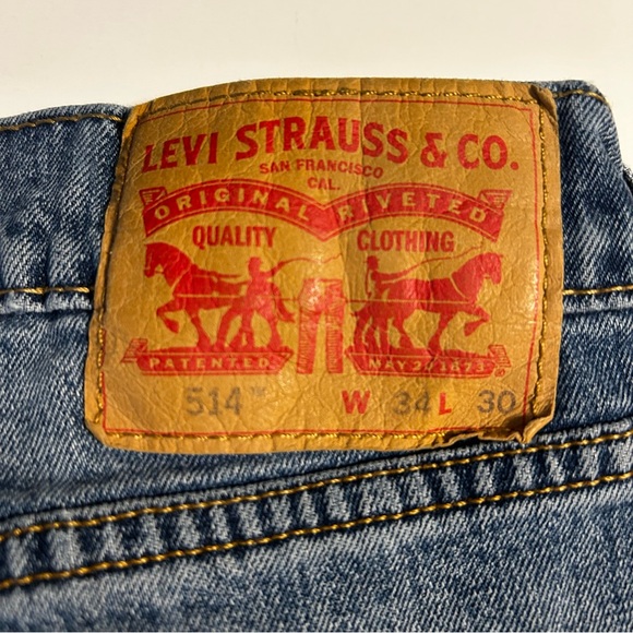 Men's Levi's 514 jeans -34x30  Thrashed Medium Wash work or play - Picture 1 of 11